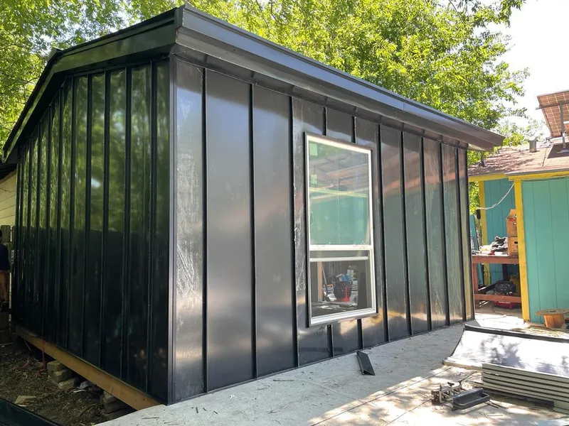 Black standing seam metal wall panels for Metal Roof Installation in Vestal