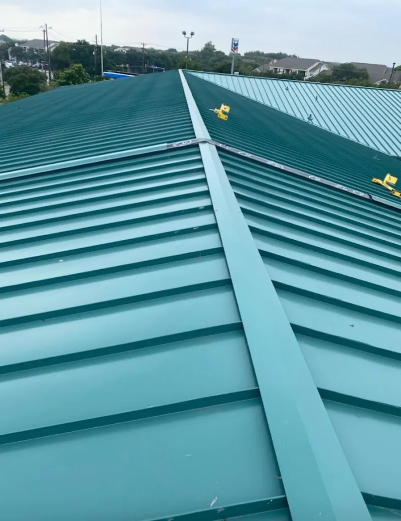 Green commercial metal roof ridge and valley for Metal Roof Repair in Vestal